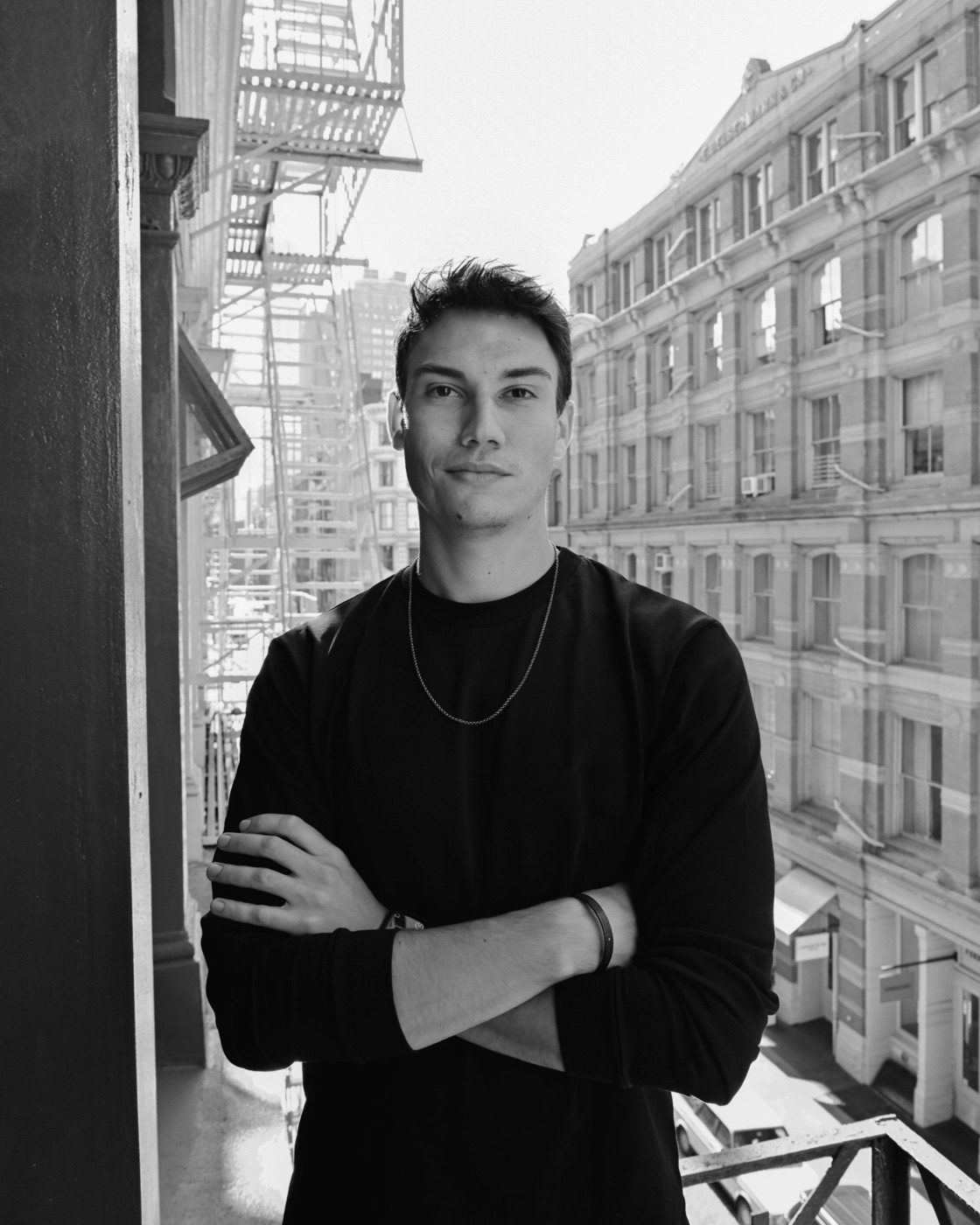 Portrait of Leonardo Bressan on a balcony in New York